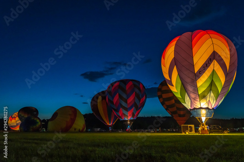 Hot air balloons at sunset at a balloon festival in Grants Pass Oregon