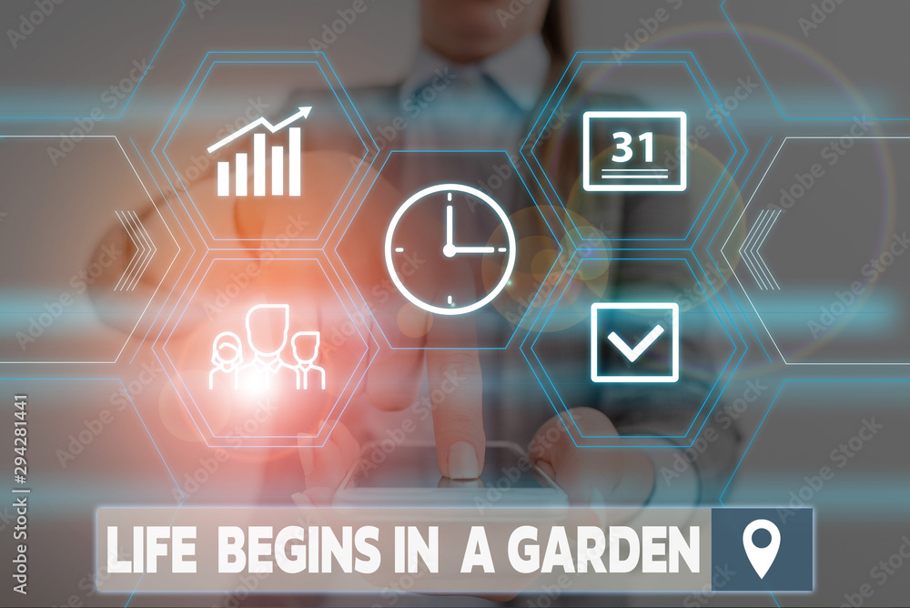Conceptual hand writing showing Life Begins In A Garden. Concept meaning Agriculture Plants growing loving for gardening Woman wear work suit presenting presentation smart device Conceptual hand writing showing Life Begins In A Garden. Concept meaning Agriculture Plants growing loving for gardening Woman wear work suit presenting presentation smart device