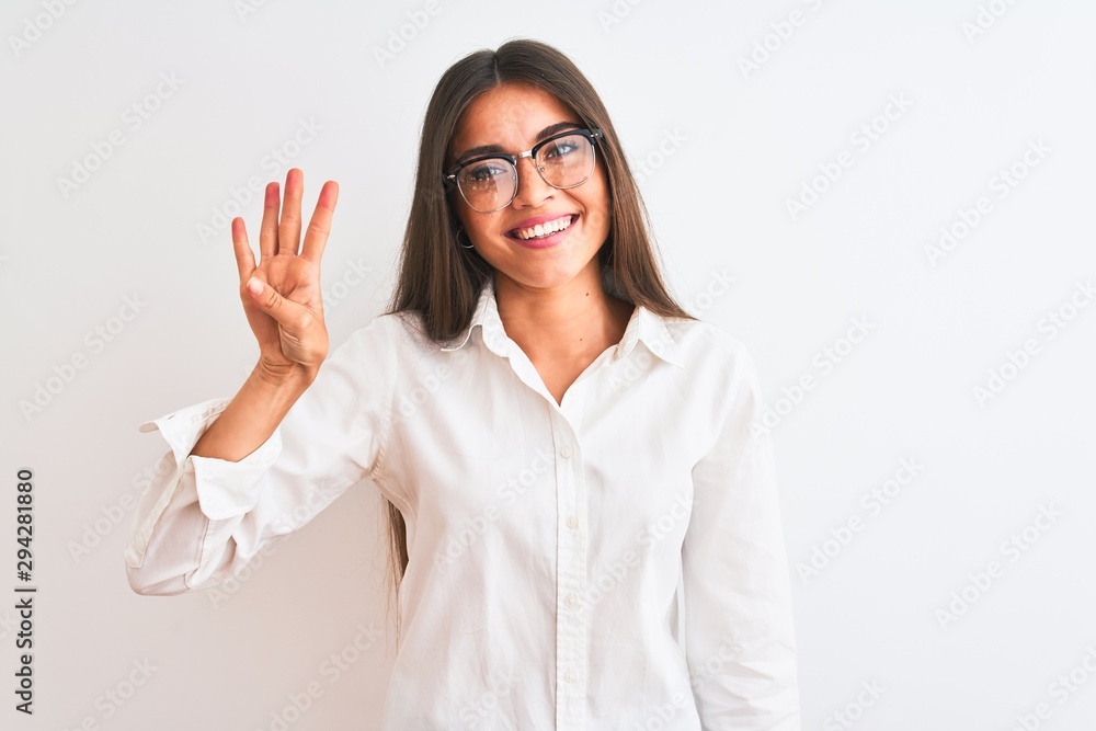 Young beautiful businesswoman wearing glasses standing over isolated white background showing and pointing up with fingers number four while smiling confident and happy. Young beautiful businesswoman wearing glasses standing over isolated white background showing and pointing up with fingers number four while smiling confident and happy.