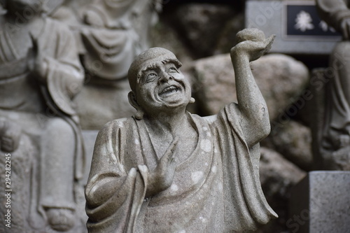 Joyfull expression statue