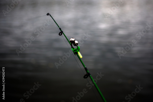 a light and sound signal is installed on the fishing rod to determine the bite in the dark