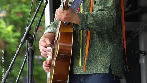 Native band entertain at music festival.