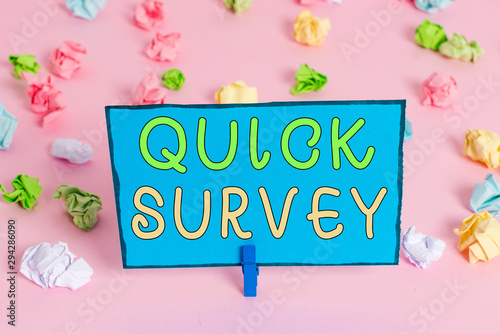 Writing note showing Quick Survey. Business concept for questionnaire that the target audience can complete right away Colored crumpled papers empty reminder pink floor background clothespin © Artur