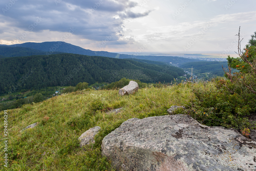 Naklejka premium landscape with mountains and clouds