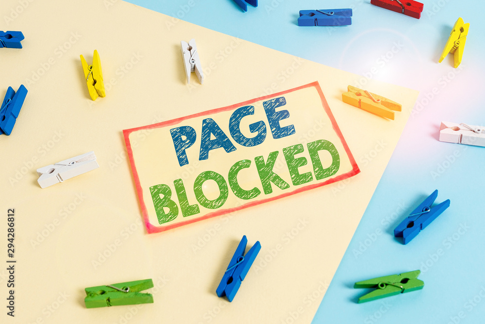 Writing note showing Page Blocked. Business concept for Users are prevented from being accessed or used the webpage Colored clothespin paper reminder with yellow blue background Writing note showing Page Blocked. Business concept for Users are prevented from being accessed or used the webpage Colored clothespin paper reminder with yellow blue background