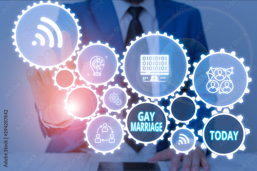 Writing note showing Gay Marriage. Business concept for entered into in a civil or religious ceremony of the same sex Male wear formal work suit presenting presentation smart device Writing note showing Gay Marriage. Business concept for entered into in a civil or religious ceremony of the same sex Male wear formal work suit presenting presentation smart device