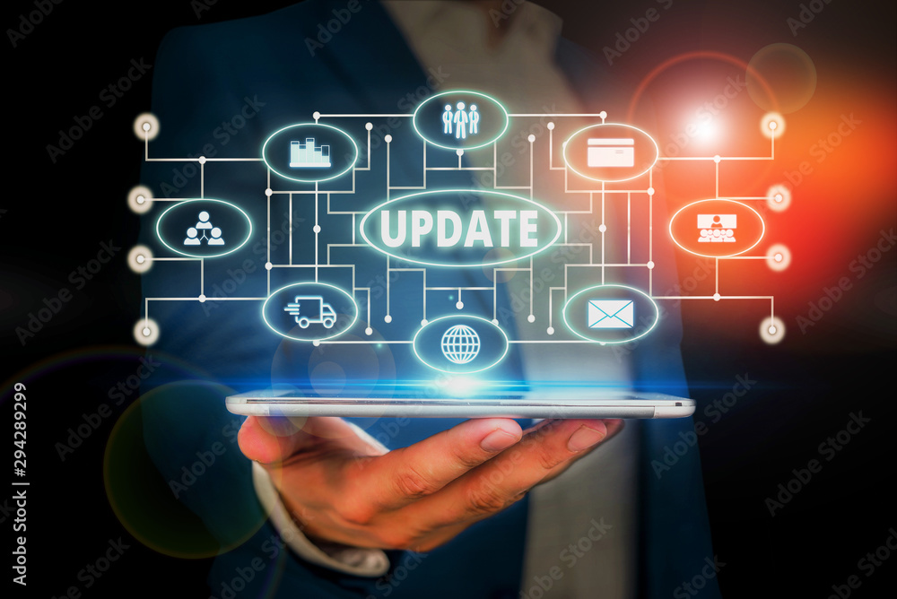 Word writing text Update. Business photo showcasing by adding new information or making corrections Up to date Male human wear formal work suit presenting presentation using smart device Word writing text Update. Business photo showcasing by adding new information or making corrections Up to date Male human wear formal work suit presenting presentation using smart device