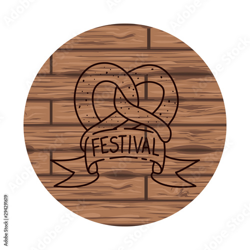 delicious pretzel with wooden background