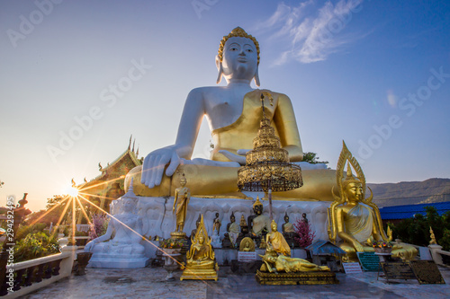 Wat Phra That Doi Kham-Chiang Mai  17 September 2019  a group of tourists come to see the scenery and make merit on the way inside the temple on the foot of a mountain  Mae Hia  Thailand.