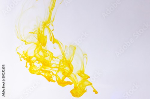 Food color drop and dissolve in water for background and texture concept.