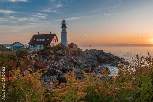 Magical sunrise at the iconic Portland Head Light. Portland, Maine
