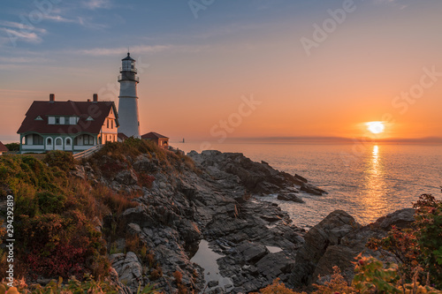 Magical sunrise at the iconic Portland Head Light. Portland, Maine