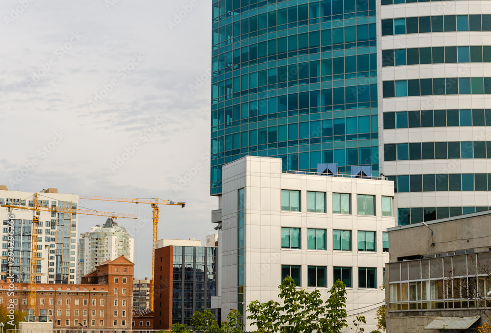 Repair of an old building with a tower crane.