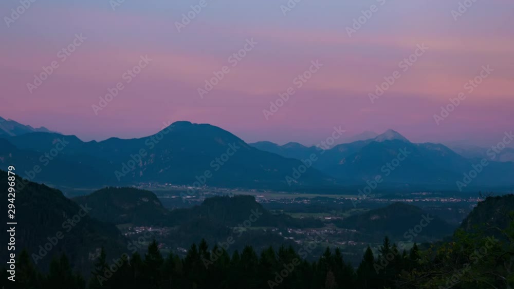 Time-lapse view on the beautiful sunrise over the majestic hills with the Lake Bled in Slovenia on a cold foggy morning. Time-lapse view on the beautiful sunrise over the majestic hills with the Lake Bled in Slovenia on a cold foggy morning.