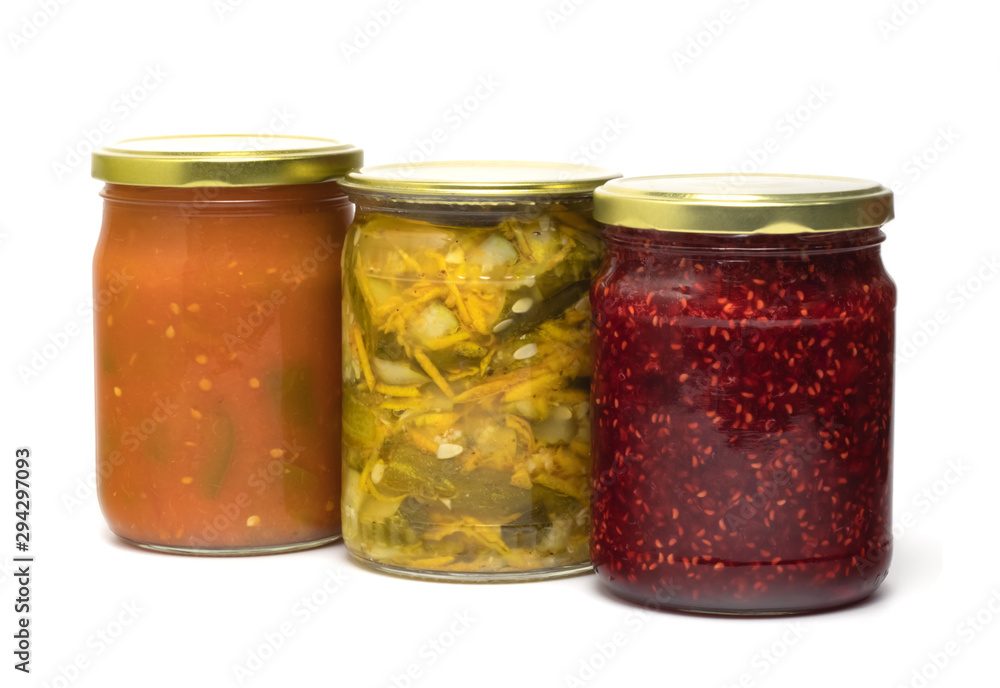 Jars with pickled vegetables isolated on white Jars with pickled vegetables isolated on white