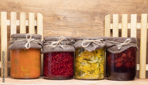 Fotografie Jars with pickled vegetables isolated on white