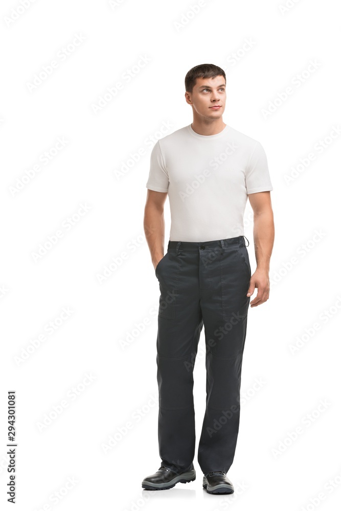 Handsome man in gray work trousers view Handsome man in gray work trousers view
