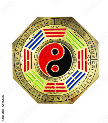 Octagon Chinese feng shui yin yang brass emblem isolated on white background with clipping path