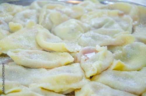 varenyky pierogi dumplings ravioli with wild strawberry Ukrainian traditional food close-up