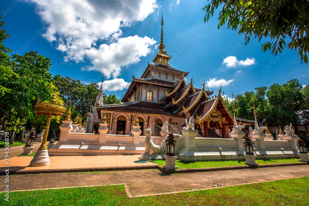 background,Open view of the temple at Dara Pirom Temple (Mae Rim),which has a large statue in front of the temple. Covered by trees and sky, Chiang Mai Province, Thailand, Wat Pa Daphirom