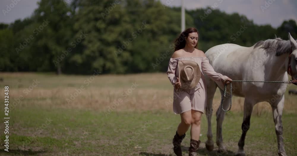 Woman Riding Horse on Farm. Recreation - Woman Walking with Horse Woman Riding Horse on Farm. Recreation - Woman Walking with Horse