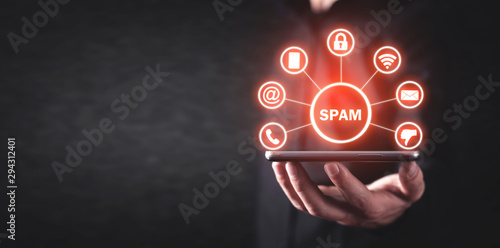 Man holding smartphone. Spam. Internet. Technology photo