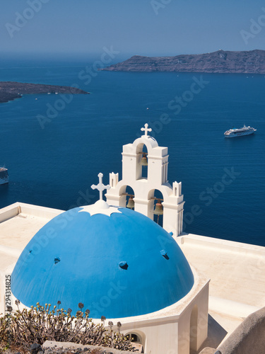 Fototapeta Naklejka Na Ścianę i Meble -  Blue Dome of St Gerasimos church in Santorini Greece
