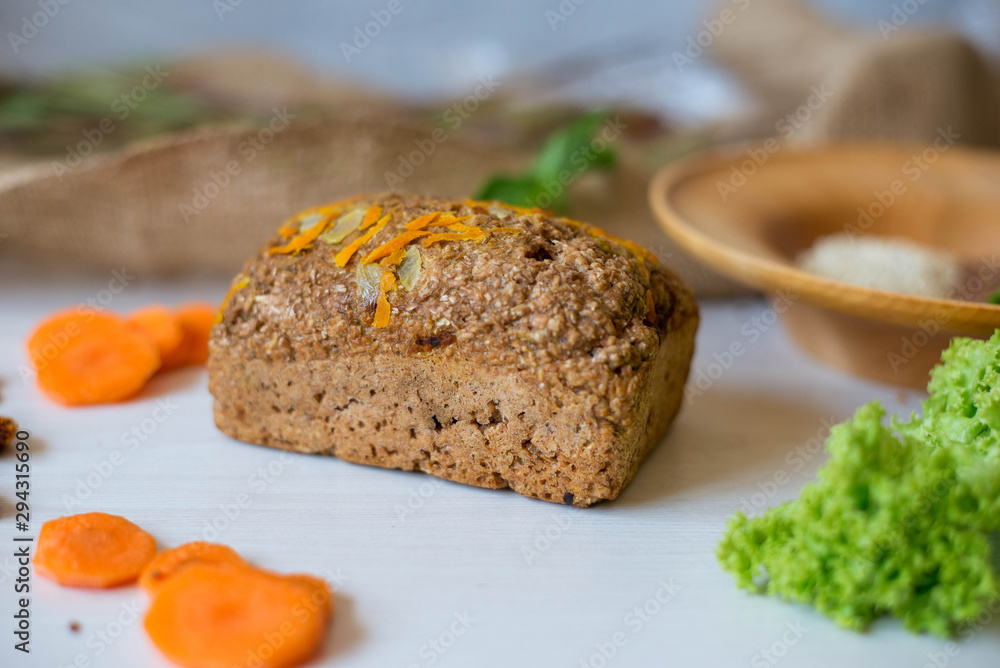 Dietary bread without yeast from whole grain flour. Healthy food, bread with vegetables and bran.