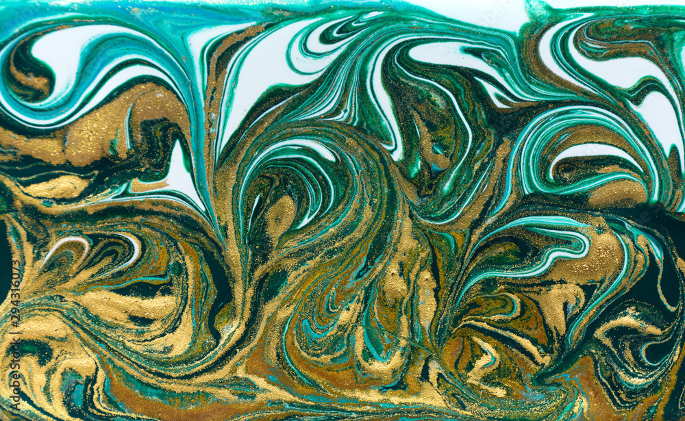 Green and gold glitter ripple pattern. Beautiful liquid texture. Green and gold glitter ripple pattern. Beautiful liquid texture.
