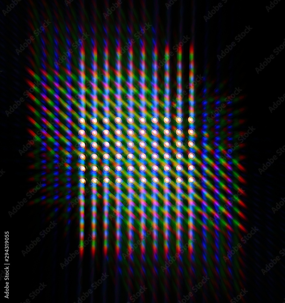 Obraz premium Photo of the diffraction pattern of LED array light, comprising a large number of diffraction orders obtained by the thin phase gratings