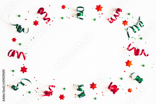 Christmas composition. Ribbon decorations on white background. Christmas, winter, new year concept. Flat lay, top view, copy space