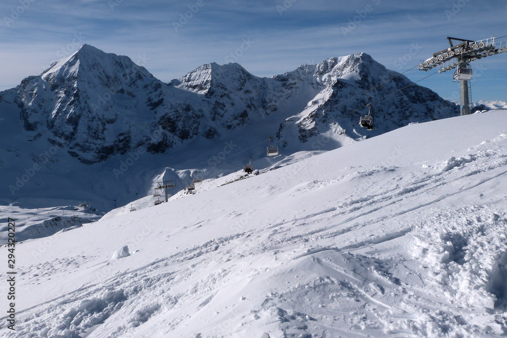 Sulden ski slopes under Ortler Mountain during winter season