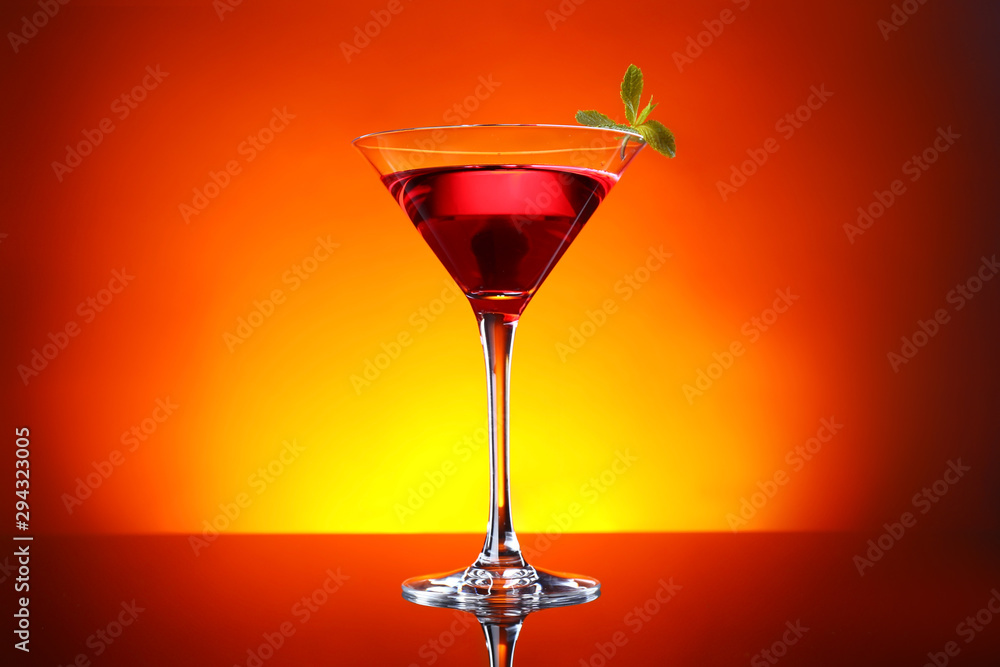 Glass of tasty cocktail on dark color background Glass of tasty cocktail on dark color background