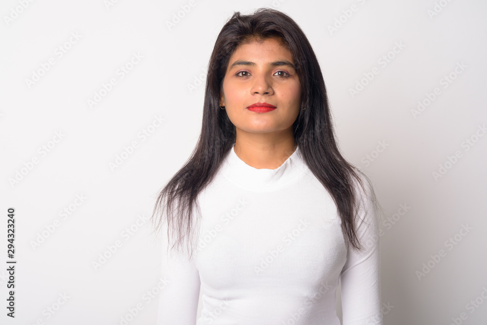 Portrait of young beautiful Persian woman looking at camera Portrait of young beautiful Persian woman looking at camera