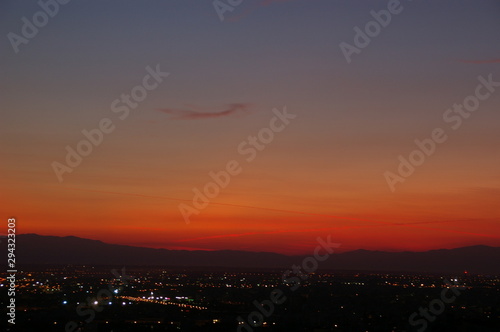 Deep red sunset over the city © Dr.Giorgos