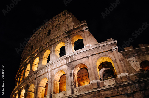 Exterior of the Colosseum or Coliseum in the night, Rome, Italy. photo