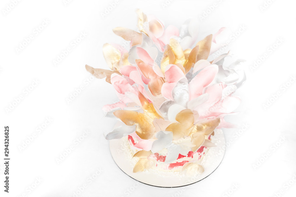 A wedding cake. Festive white cake with butterflies.