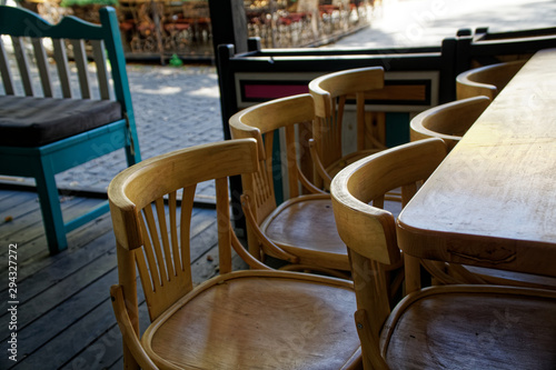 Fototapeta Naklejka Na Ścianę i Meble -  Wooden Vintage chairs in cafe, modern cozy interior
