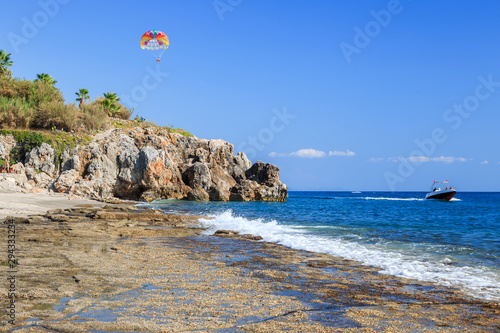 Seascape near Alanya, Turkey. Parasailing over the sea. photo