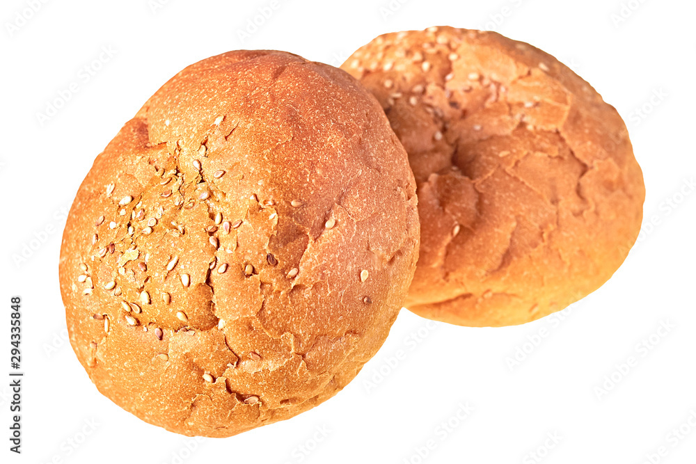 Pair of tasty soft fresh whole round buns with sesame seeds for hamburger, cheeseburger or cooking other burgers. Isolated on white background. Close-up Pair of tasty soft fresh whole round buns with sesame seeds for hamburger, cheeseburger or cooking other burgers. Isolated on white background. Close-up