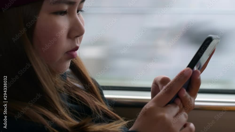 4K young woman using mobile phone 4K young woman using mobile phone