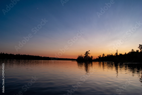 Amazing sunset at a Canadian lake © kishimaru