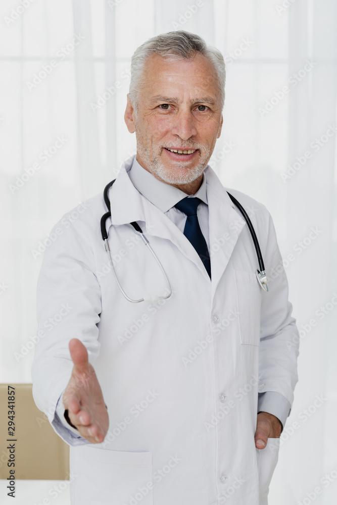 Doctor holding out his hand Doctor holding out his hand
