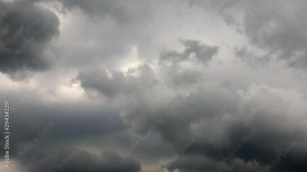 Clouds in the sky, storm approaching, before rain, grey heavy and black clouds moving high in the sky, cloudy day, bad weather, global warming Clouds in the sky, storm approaching, before rain, grey heavy and black clouds moving high in the sky, cloudy day, bad weather, global warming