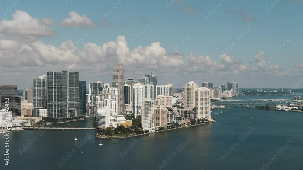 Panning aerial view of downtown Miami skyline with clouds 4K Panning aerial view of downtown Miami skyline with clouds 4K