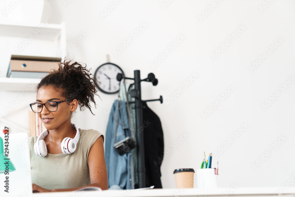 Woman sit in office using laptop computer