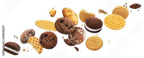 Foto Falling cakes, cookies, crackers, waffles isolated on white background