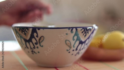 Woman drinking soup