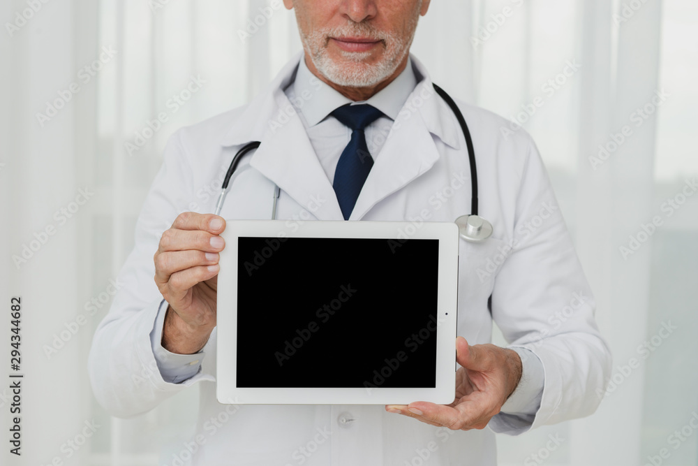 Close-up doctor showing tablet screen mock-up Close-up doctor showing tablet screen mock-up
