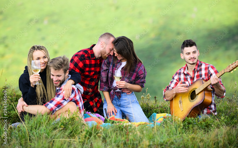 Celebrate holiday. Summer adventures. Hike with guitar. Leisure in nature. Group friends relaxing picnic. Friends enjoy vacation. Hike picnic. People eating food. Youth having fun picnic in highlands Celebrate holiday. Summer adventures. Hike with guitar. Leisure in nature. Group friends relaxing picnic. Friends enjoy vacation. Hike picnic. People eating food. Youth having fun picnic in highlands